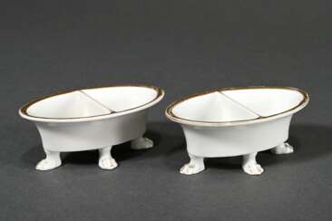 Pair of Nymphenburg porcelain salt cellars on smal…