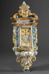 Majolica wall-mounted holy water font in baroque a…