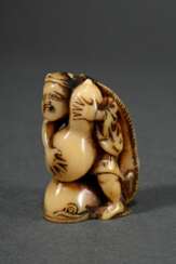 Fine stag horn netsuke ‘Kadori Myojin tames Namazu…