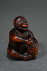 Boxwood netsuke ‘Monkey with turtle’, dark stained…