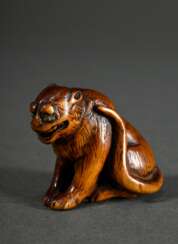 Boxwood netsuke ‘Tiger’ with inlaid brass eyes, Ja…