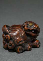 Large boxwood netsuke ‘Mighty Shishi’ on powerful …
