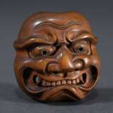 Boxwood netsuke ‘Nō mask frown Shikami’ with curve… - photo 1