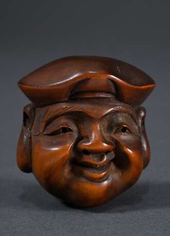 Boxwood netsuke ‘Ebisu mask’, signed Deme kore sak… - photo 1