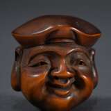 Boxwood netsuke ‘Ebisu mask’, signed Deme kore sak… - photo 1
