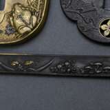3 Various Japanese sword fittings: Iron tsuba in m… - photo 5