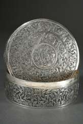Round silver lidded box with rich repoussé decorat…