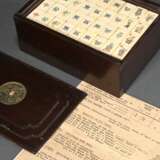 Mahjong game in wooden box with bronze ‘cash coin’… - photo 1