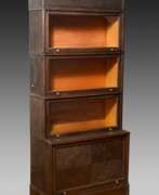 Обзор. Patent bookcase with 4 compartments, marked: ‘Idea…
