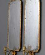 Beleuchtung. Paar schmale antike Spiegelblaaker in floral getri…