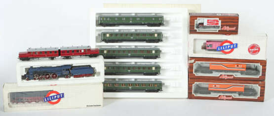 Konvolut Eisenbahn Liliput, Spur H0, 1 x Dampflok m. Tender Nr. 101 29… - photo 1 Konvolut Eisenbahn Liliput, Spur H0, 1 x Dampflok m. Tender Nr. 101 29… - photo 1