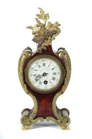 Kleine Kaminuhr im Rokokostil Frankreich, um 1920, Emaille-Zifferblatt… - photo 1 Kleine Kaminuhr im Rokokostil Frankreich, um 1920, Emaille-Zifferblatt… - photo 1