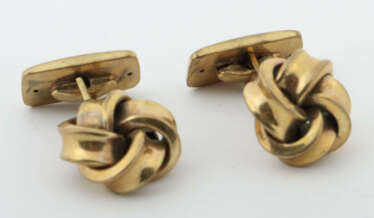 2 Manschettenknöpfe 20. Jhr., Paar Manschettenknöpfe in gewundener Sch…