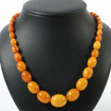 Bernsteinkette 20. Jhr., verschieden große Bernsteinperlen im Verlauf,… - Foto 1