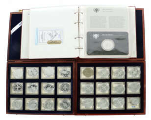 Album & 2 Etuis Album mit 6 Münzen zum Jahr des Kindes, über 500 g Fei…