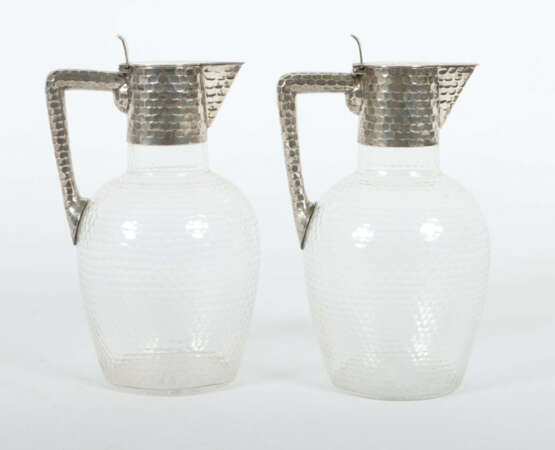 Paar Karaffen Koch & Bergfeld, Bremen, 20. Jh., Silber 800/farbloses G… - фото 1 Paar Karaffen Koch & Bergfeld, Bremen, 20. Jh., Silber 800/farbloses G… - фото 1