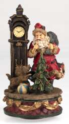 Spieluhr "Weihnachtsmann mit Standuhr und Hund", Gußmasse farbig gefasst, Melodie "OhTannebaum", funktionstüchtig, H. 22 cm, Dm. 11 cm