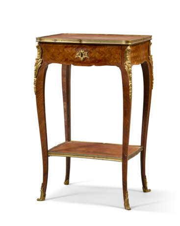 A LOUIS XV ORMOLU-MOUNTED TULIPWOOD, PARQUETRY AND MARQUETRY TABLE A ECRIRE - photo 1 A LOUIS XV ORMOLU-MOUNTED TULIPWOOD, PARQUETRY AND MARQUETRY TABLE A ECRIRE - photo 1