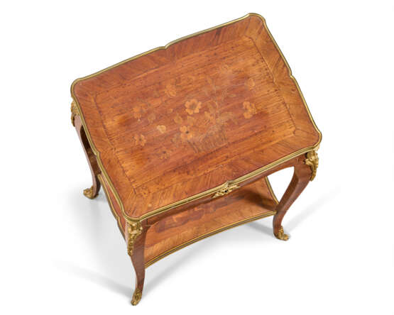 A LOUIS XV ORMOLU-MOUNTED TULIPWOOD, PARQUETRY AND MARQUETRY TABLE A ECRIRE - photo 5 A LOUIS XV ORMOLU-MOUNTED TULIPWOOD, PARQUETRY AND MARQUETRY TABLE A ECRIRE - photo 5