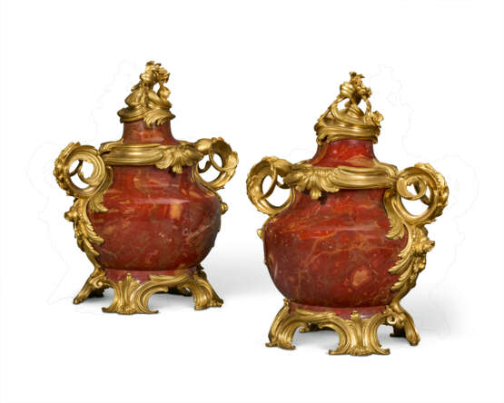 A PAIR OF FRENCH ORMOLU MOUNTED RED JASPER COVERED VASES - photo 1 A PAIR OF FRENCH ORMOLU MOUNTED RED JASPER COVERED VASES - photo 1