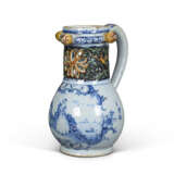 A DUTCH DELFT MIXED TECHNIQUE PUZZLE JUG - Foto 1