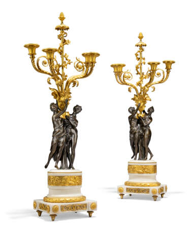 A PAIR OF LOUIS XVI FOUR-LIGHT ORMOLU-MOUNTED PATINATED-BRONZE AND WHITE MARBLE CANDELABRA - фото 1 A PAIR OF LOUIS XVI FOUR-LIGHT ORMOLU-MOUNTED PATINATED-BRONZE AND WHITE MARBLE CANDELABRA - фото 1