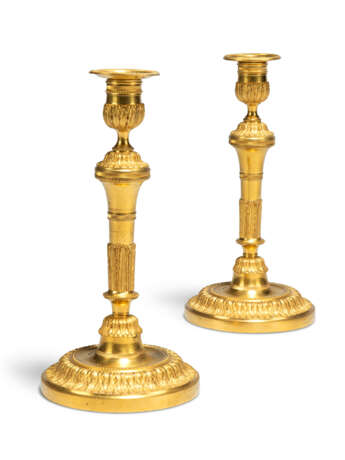 A PAIR OF LOUIS XVI ORMOLU CANDLESTICKS - photo 1