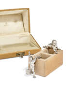 Silber. A SILVER-MOUNTED CLAY BRICK MATCH HOLDER