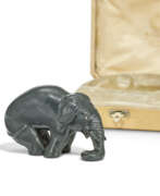 Calcul. A JEWELLED KALGAN JASPER MODEL OF AN ELEPHANT