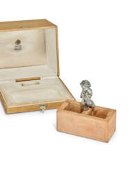 A SILVER-MOUNTED CLAY BRICK MATCH HOLDER