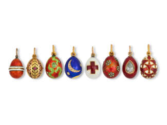 EIGHT JEWELLED, GUILLOCH&#201; AND CHAMPLEV&#201; ENAMEL GOLD AND SILVER EGG PENDANTS