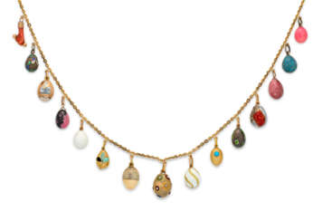 A NECKLACE OF FIFTEEN JEWELLED, GOLD, SILVER, HARDSTONE, GUILLOCH&#201; AND CLOISONN&#201; ENAMEL EGG PENDANTS