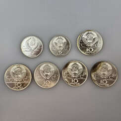 Sieben Silbermünzen zu den Olympischen Spielen 198…