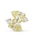 Rings. VAN CLEEF &amp; ARPELS COLOURED DIAMOND AND DIAMOND RING