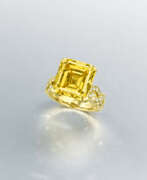 Coloured diamond. COLOURED DIAMOND AND DIAMOND RING