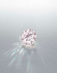 A RARE COLOURED DIAMOND