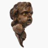 A pair of winged putti heads - фото 4
