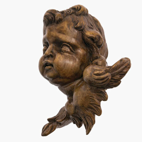 A pair of winged putti heads - фото 5