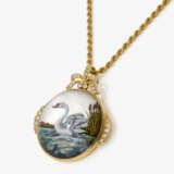 A pendant with a swan and diamonds, and a cord necklace - фото 2