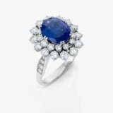 An entourage ring with sapphire and brilliant-cut diamonds - фото 1