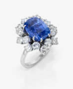 Ювелирные изделия. An Entourage ring with sapphire and brilliant-cut diamonds