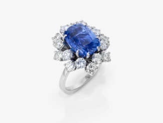 An Entourage ring with sapphire and brilliant-cut diamonds