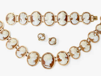 A parure consisting of a necklace, bracelet, and two rings with shell cameos