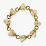 A bracelet with deer eye teeth - photo 1