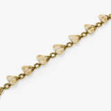 A bracelet with deer eye teeth - photo 2