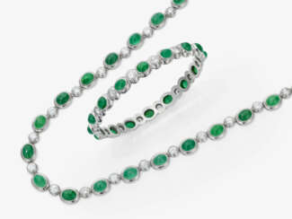 A necklace and bangle with brilliant-cut diamonds and emeralds