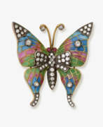 Broschen und Anstecknadeln. Historische Schmetterlingsbrosche verziert mit Fensteremail und Diamanten