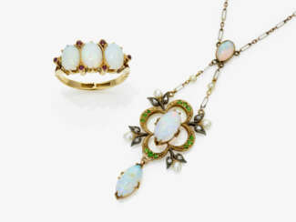 A necklace with crystal opals, diamonds, diopsides and small pearls, and a ring with crystal opals and tiny rubies