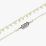 A natural pearl necklace set with fancy light yellow Briolette-cut diamonds of 16 carats - фото 1