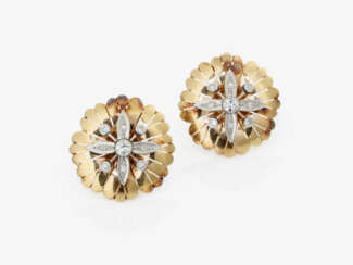 A pair of striking historical stud earrings set with brilliant-cut diamonds